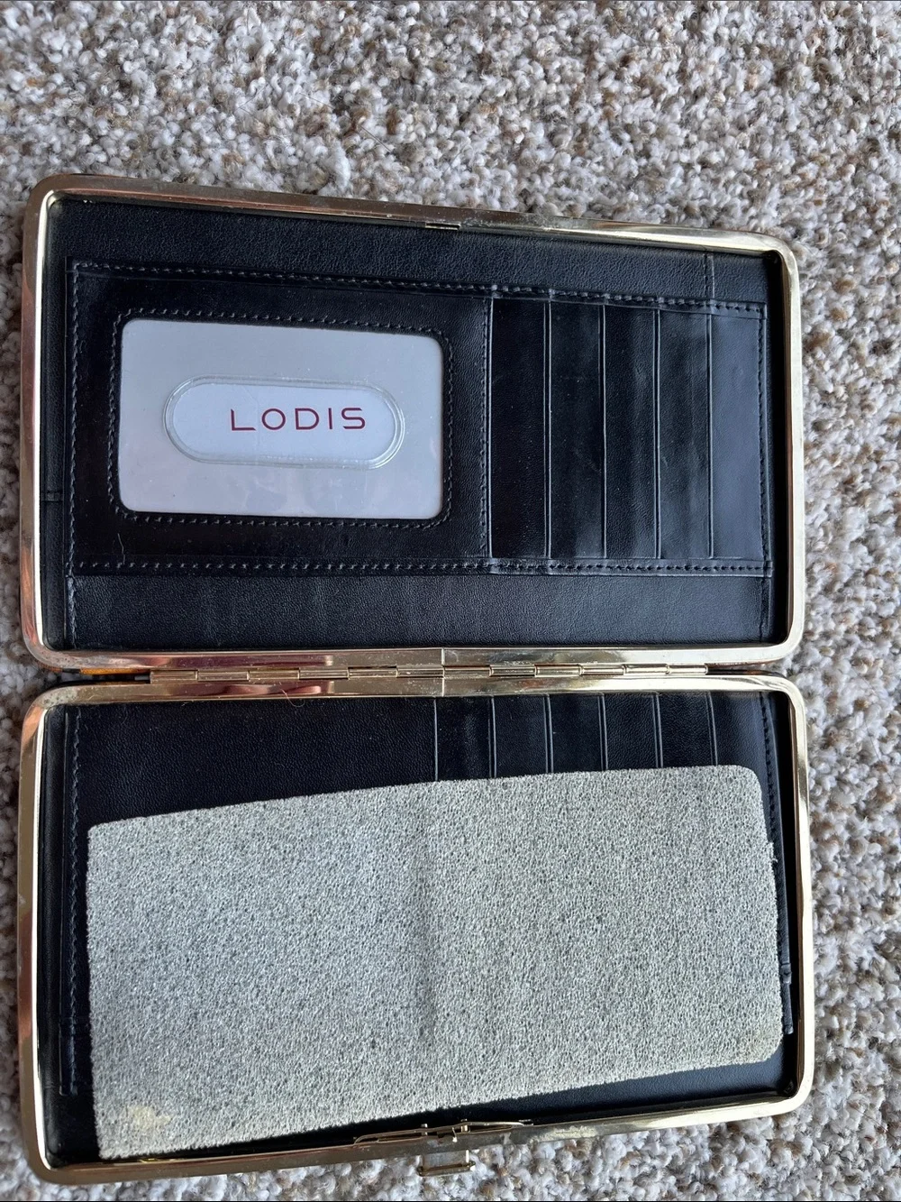 Lodis Black Leather snap wallet.